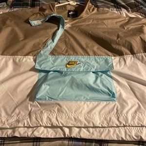 Brand new Nike windbreaker, never worn. Size X-Large. Paid 100blue, white , grew